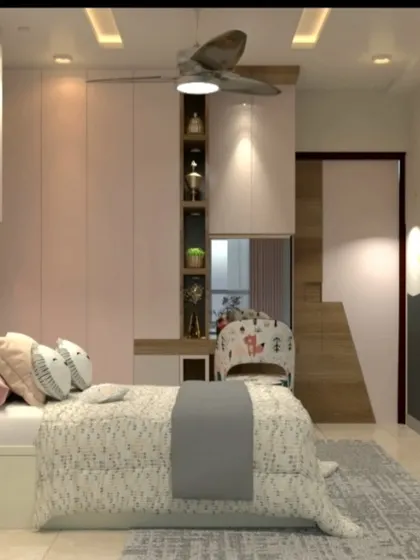 Another view of the pink room, showing the custom wardrobe with an integrated dressing table.
