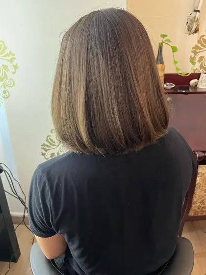 The back view of Tanusha's chic new haircut.