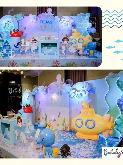 A duplicate of image 186, showing the full stage and a closer view of the yellow submarine at Tejas's under-the-sea party.