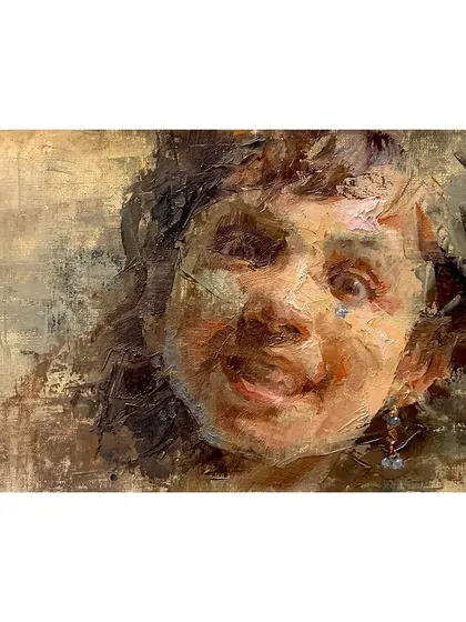 A horizontal composition of "The Smile Spectrum," showing a child's joyful expression.