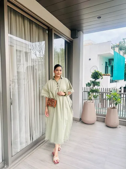 This outfit is all about effortless summer style, and the unique purse is the star of the show.