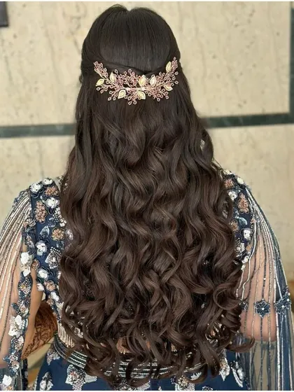 Let your hair dance freely. For this sangeet look, I created these beautiful, defined waves and added a statement accessory for a touch of glamour.
