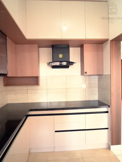 Another view of the Prestige Finsbury Park kitchen, showing the efficient layout and the combination of handleless drawers and cabinets. The design is minimalist, functional, and perfectly tailored to the client's taste.