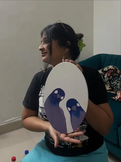 Holding up my finished pigeon painting from a fun art night with friends. It’s a simple piece, but it holds the memory of a great evening.