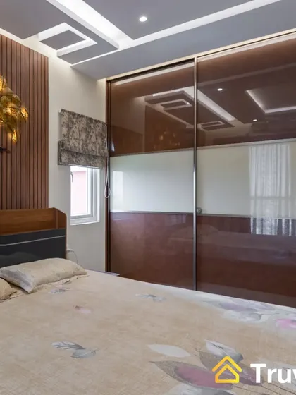 A duplicate of image 158, showing the master bedroom with the brown glass sliding wardrobe.