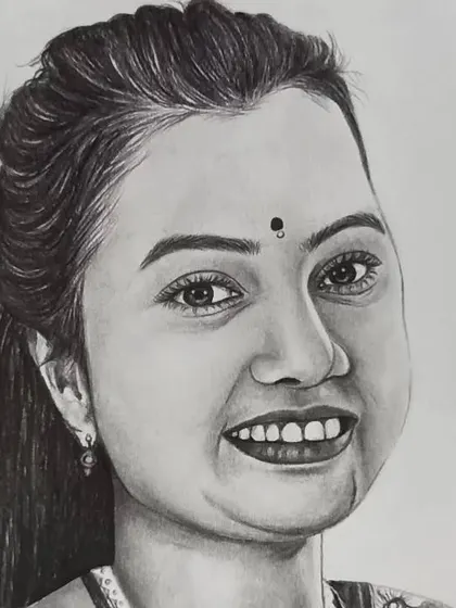 A close-up of the woman's smiling face from the same couple portrait, highlighting the bindi and the joyful expression I aimed to capture.