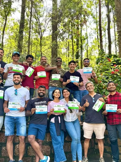 The night before the big day. Our team holding up their race bibs, filled with excitement and anticipation for the Malnad Ultra.