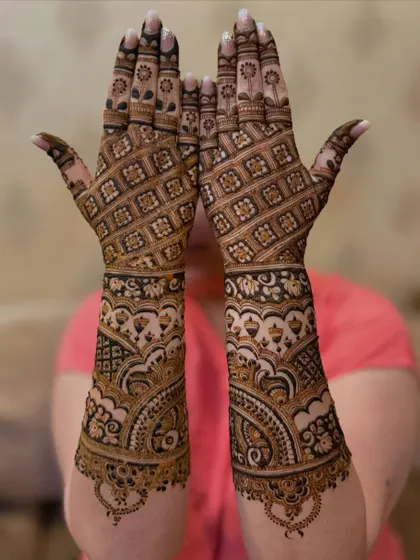 Celebrating a silver jubilee! This intricate grid design was created for a 25th wedding anniversary, proving that mehendi is for every celebration.