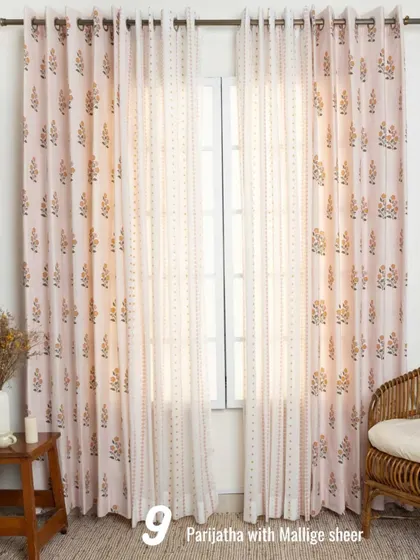 The soft pink tones of our Parijatha cotton curtains are beautifully complemented by the delicate Mallige sheer. This combination creates a romantic and gentle ambiance, ideal for a peaceful bedroom or a quiet reading nook.