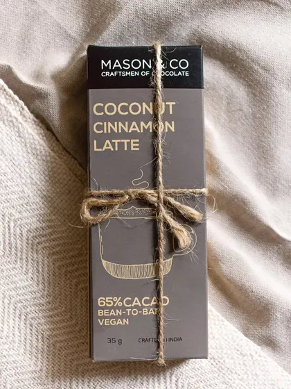 Another beautiful shot of our special chocolate bar, tied with twine for a gift-ready look. It’s a little piece of Copper + Cloves you can share.