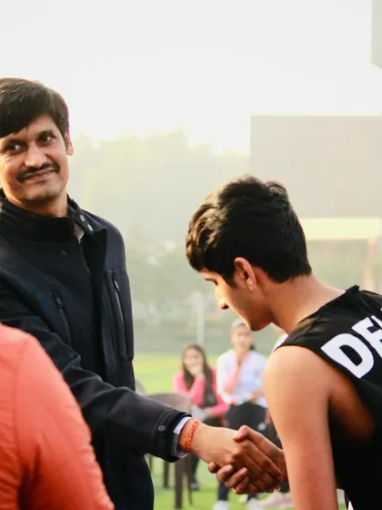 Mr. Mohit Bhandari sharing a handshake with one of our players. It's these personal interactions with mentors that can spark a lifelong passion for the sport.