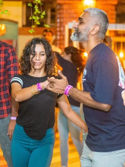 A focused and intense moment during a dance. The connection is palpable.