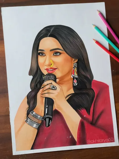 A colored pencil portrait of the amazing singer Shreya Ghoshal. I really enjoyed drawing her expressive face and the details of her jewelry and microphone.