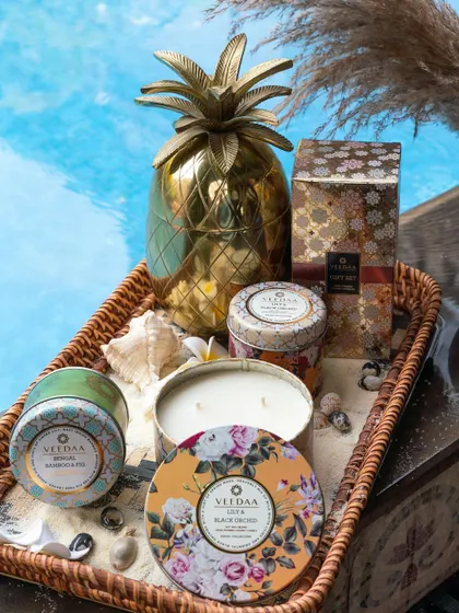 A summer tray filled with our favorite scents, including Lily & Black Orchid and Bengal Bamboo & Fig. These decorative tin candles are perfect for bringing a touch of the season indoors.