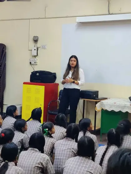 Addressing a classroom of students about the challenges and rewards of a career in law. I believe in sharing my experience to guide those who are passionate about justice.