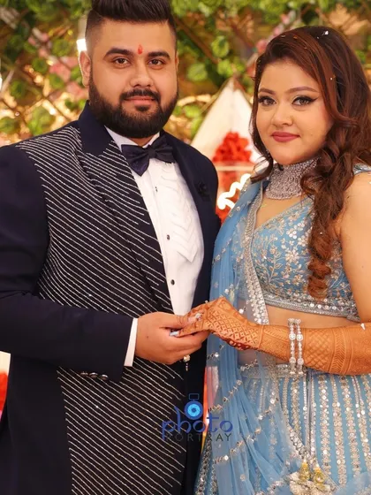 A classic couple portrait from an engagement ceremony. We ensure you get beautiful, well-lit photos together to remember your special day.