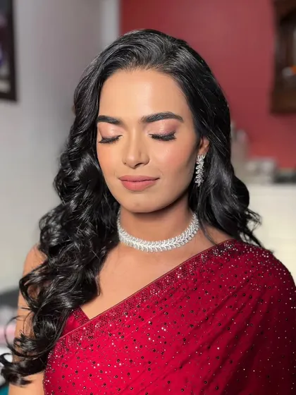 A close-up of the soft glam makeup. The eyeshadow is blended to perfection, and the skin has a luminous, healthy glow that looks beautiful and natural.