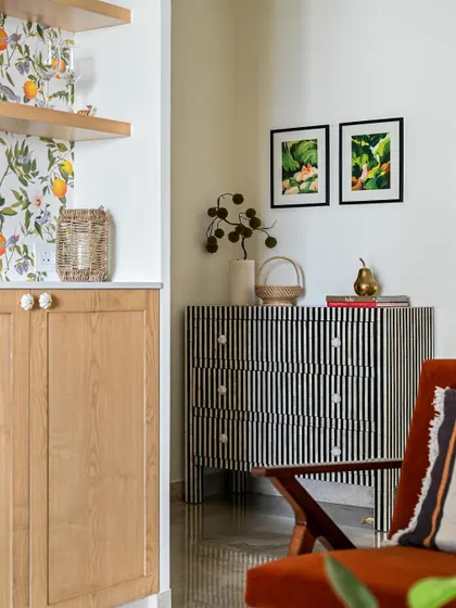 A bold, bone-inlay striped chest of drawers makes a graphic statement. We love to mix patterns and materials to create dynamic and interesting spaces.