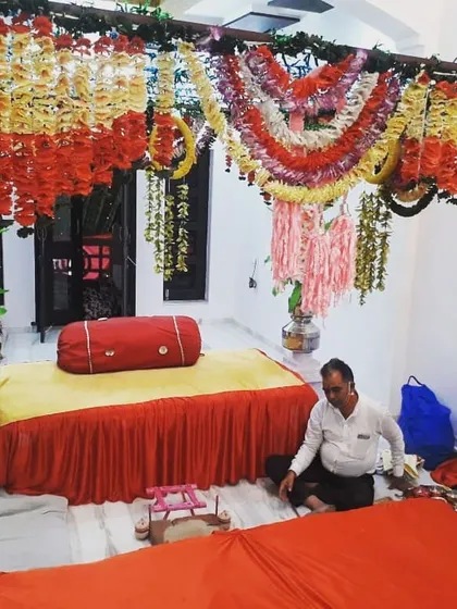 Beyond dining, we cater to traditional ceremonies. This image shows a floor seating arrangement we prepared for a religious ritual, complete with festive floral decor.