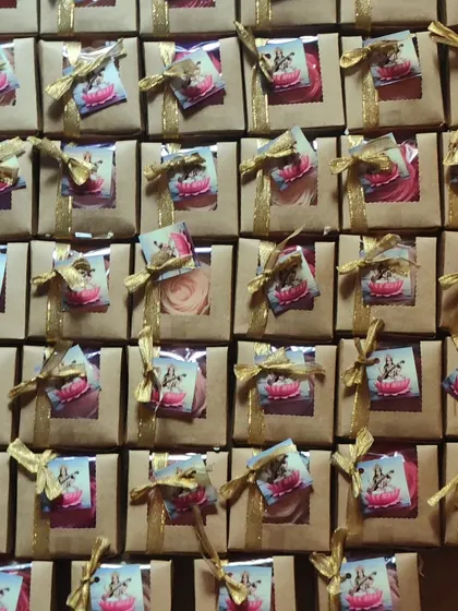 A large batch of the festival return favors, each one carefully packaged.