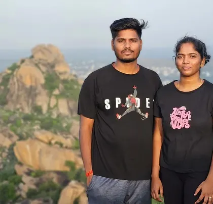 A couple enjoying a quiet moment at the top of Kunti Betta.