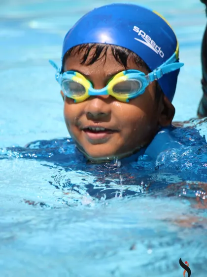 Happy faces in the pool are our greatest reward. These close-ups capture the confidence our students feel after mastering a new skill.