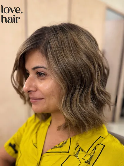 A side profile of the mocha mousse bob, showing off the flattering cut and color.