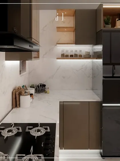 A detailed 3D visualization of the kitchen's appliance and storage area, featuring a large refrigerator and ample cabinet space.