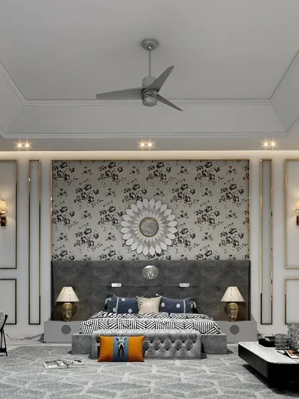 This spacious master bedroom design features a bold floral wallpaper as a statement accent wall behind the bed. I used classic wall paneling, symmetrical sconce lighting, and a detailed tray ceiling to create a sense of grandeur and traditional elegance.