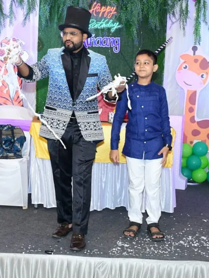 A young volunteer helps me with a classic rope and silk illusion. These interactive moments are perfect for birthday parties, making the birthday child and their friends feel extra special.