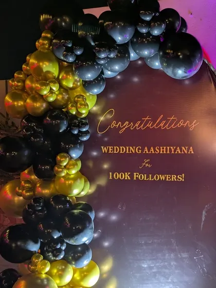 This image showcases the balloon garland under different lighting, showing how the colors and finish look in a nighttime party environment.