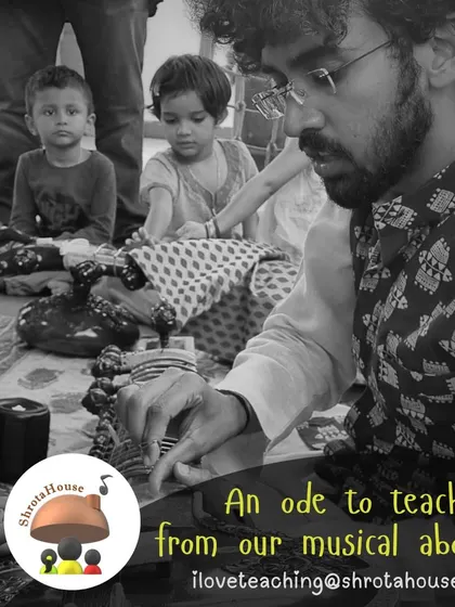 An instructor guides children as they feel the texture and sound of a percussion instrument. These sensory experiences are fundamental to our teaching philosophy.
