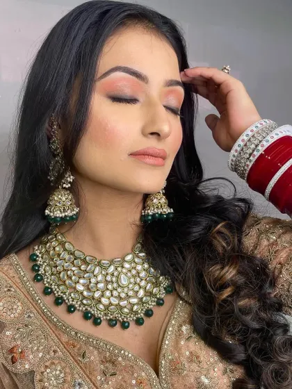 The closed-eye shot allows a clear view of the simple yet elegant eye makeup. Sometimes, less is more, and you will learn the art of subtlety.