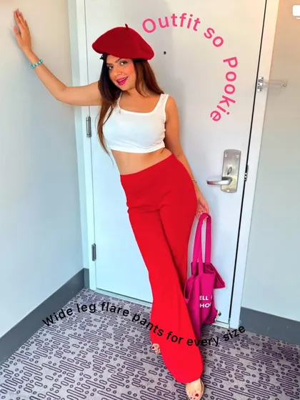 The full 'pookie' outfit, complete with a red beret. This look is all about having fun with fashion.