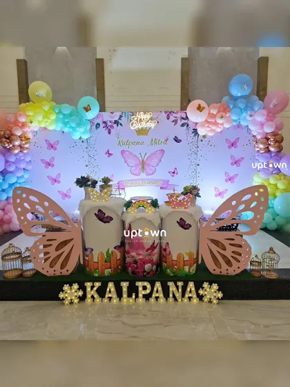 The full view of the pastel butterfly birthday setup.