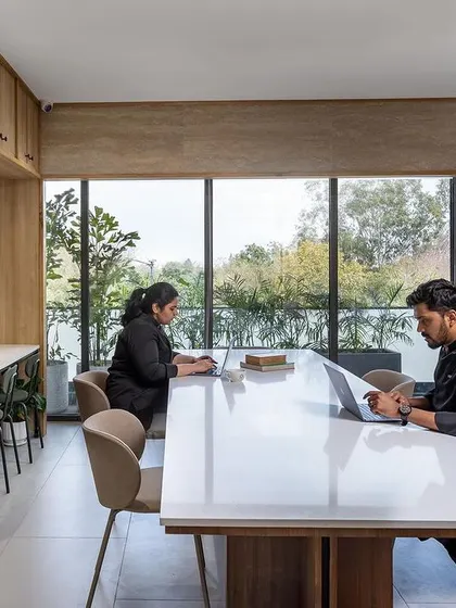 Our academy includes quiet, comfortable spaces like this library and study area, where students can research, work on concepts, and collaborate on projects.
