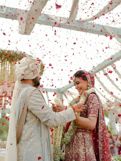 The varmala exchange, a moment of playful tradition and pure joy. I design the ceremony flow to ensure these key rituals are both beautifully photogenic and full of life.