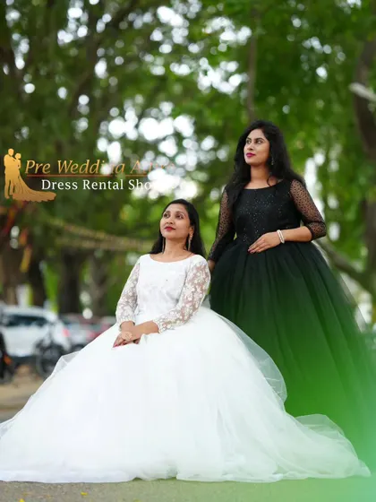 This image showcases two different styles of ball gowns, one in classic white and the other in elegant black, perfect for friends or sisters doing a photoshoot together.