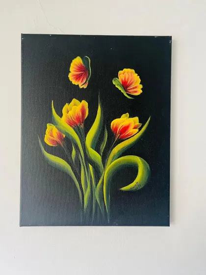 Another example of one-stroke tulips on a dark background. This technique is versatile and can be used to create many different types of flowers and leaves.