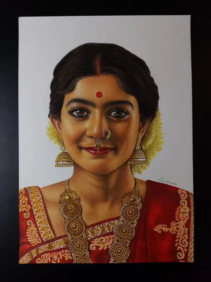 The final artwork of my Sai Pallavi sketch, showing the rich colours and details that make colour pencil portraits so special.