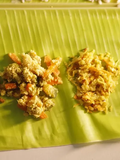 The dry vegetable preparations are key to the Sadya's texture. This image shows a variety of thorans (stir-fried vegetables with coconut) and a creamy Avial, a medley of vegetables in a coconut and yogurt gravy.