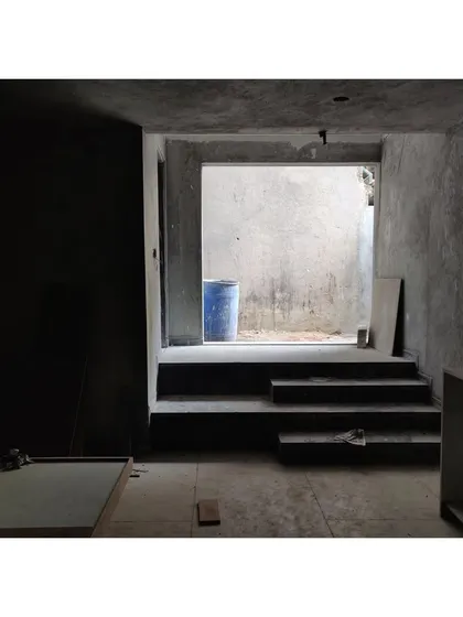 The space during construction. Even in its raw state, the potential of the space is visible through the composition and the way light enters from the opening.