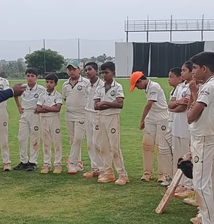 A coach provides tactical guidance to our U-12 team. Mentorship is at the core of our academy, with experienced coaches working closely with every player to guide their development.