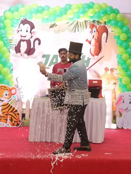 Creating a magical snowstorm on stage. This effect adds a beautiful, theatrical touch to the finale of my birthday magic show.