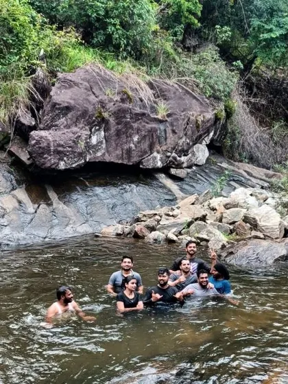 A few trekkers enjoying a dip in the river.