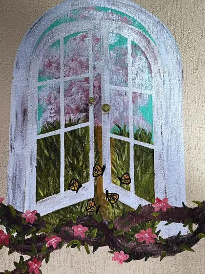 Another detail shot of the magical window, a perfect piece of escapism painted on a wall.