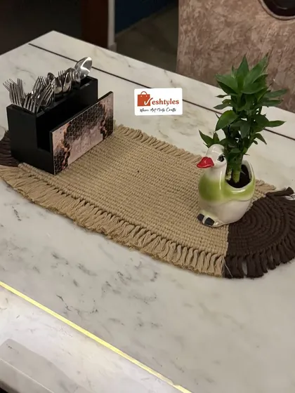 This table mat is a beautiful and practical piece of home decor. It's perfect for adding a touch of bohemian style to your dining area.
