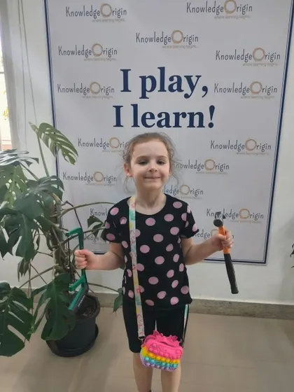 This young girl is ready for a day of creativity and construction. My camps are a place where children can explore their interests and discover new talents.