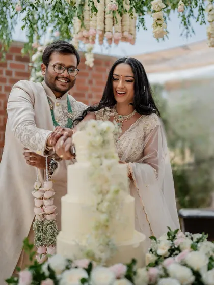 The sweet moment of the cake cutting ceremony. We capture the joy and the beautiful details of your wedding cake, a centerpiece of the reception.