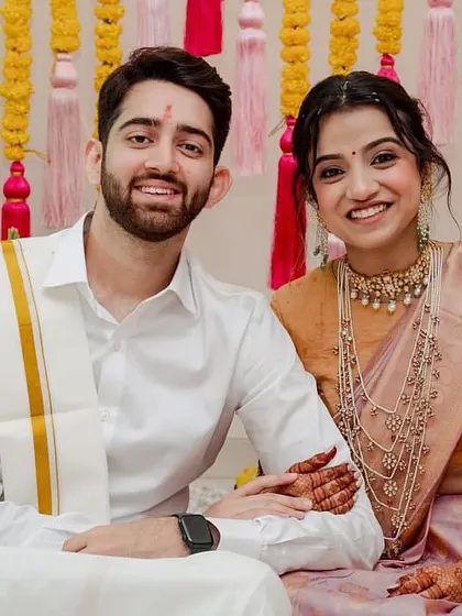 A beautiful South Indian bridal look for a wedding ritual. The makeup is simple and elegant, paired with a classic low bun and traditional temple jewelry.